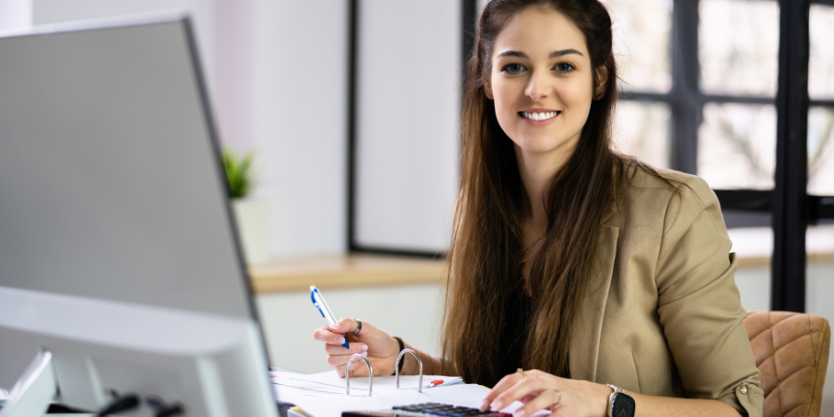 Woman Smiling While Working